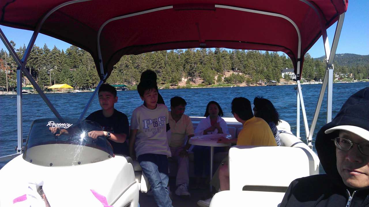 Cameron driving the boat