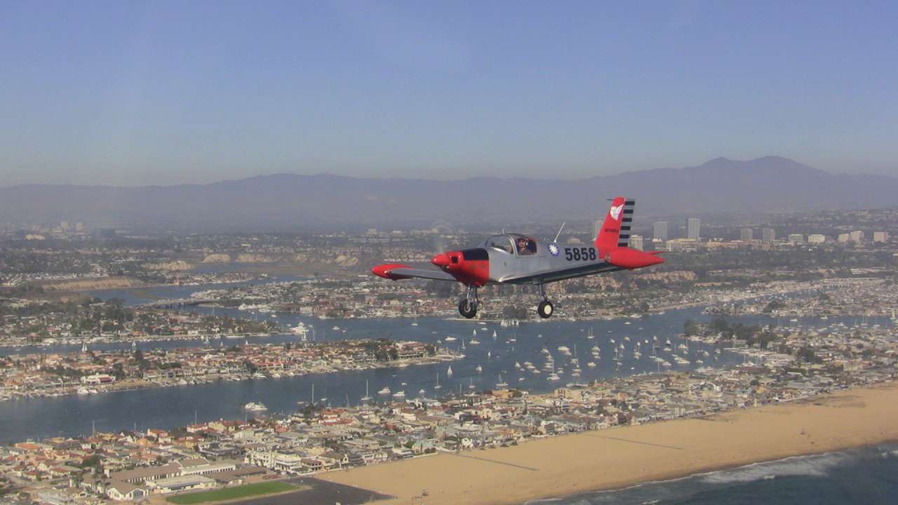 Wingman Robin Hou over New Port Beach CA