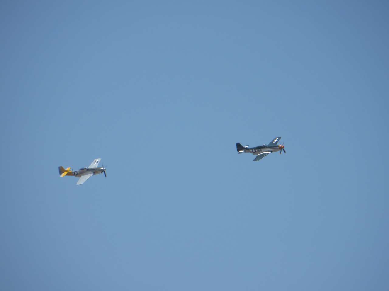 click to view full size photo P-51 x 2