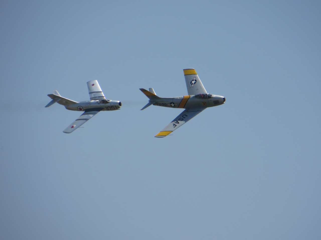 click to view full size photo Mig-15 and F-86