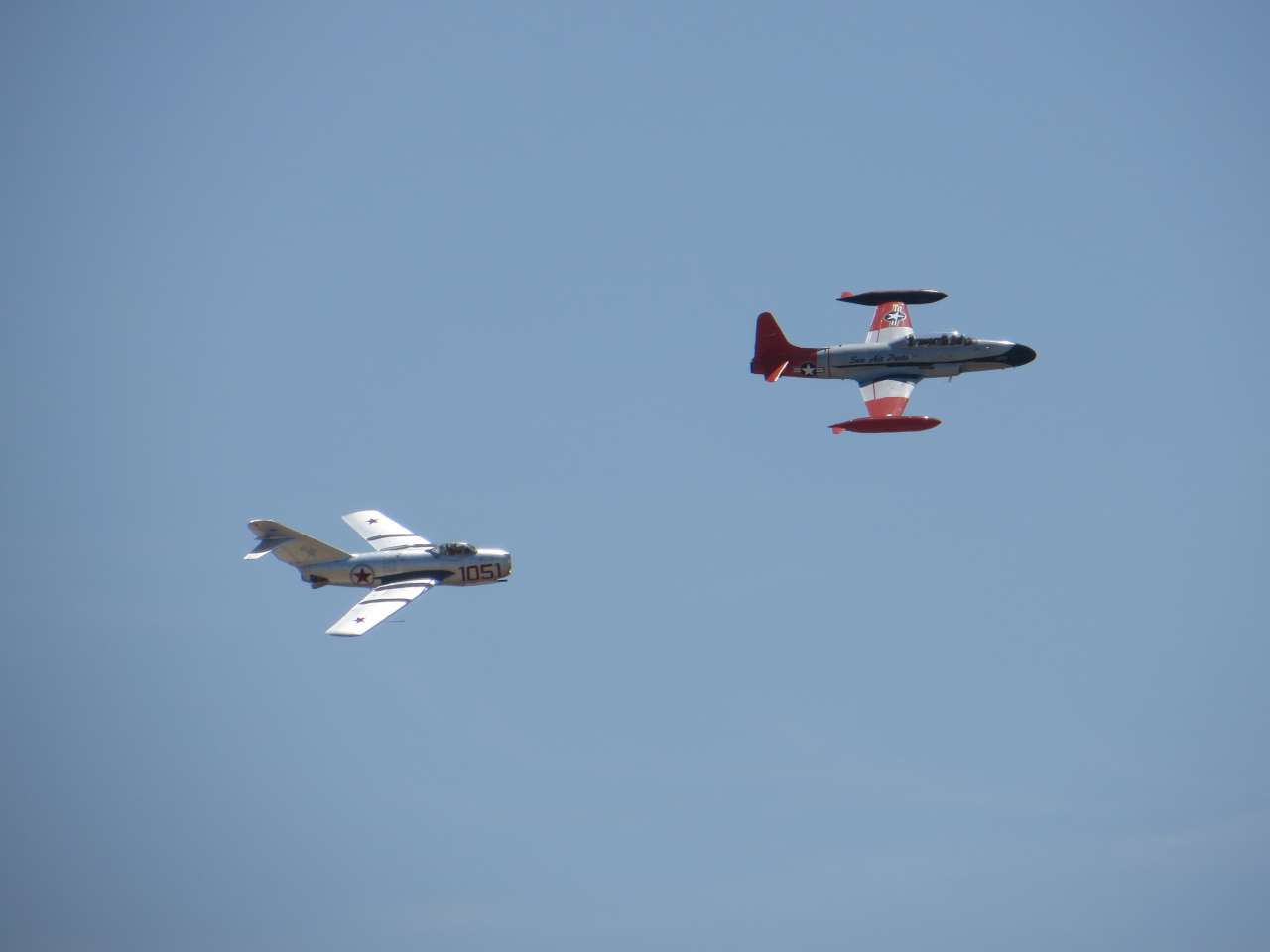 click to view full size photo Mig's on the tail and closing fast!!! (Mig-15 has to deploy speed break!)