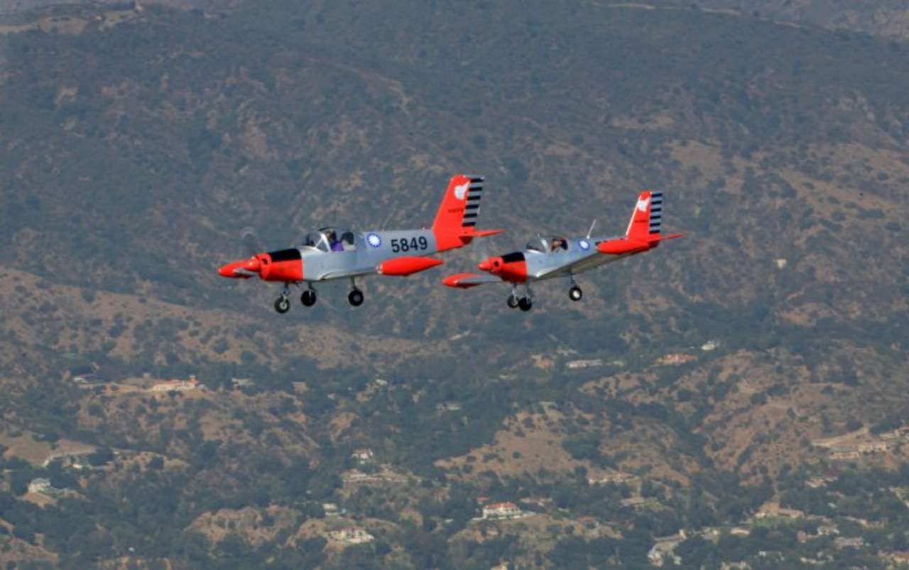 click to view full size photo Flying Jeffrey's PL-2 in formation with Leo's PL-1B